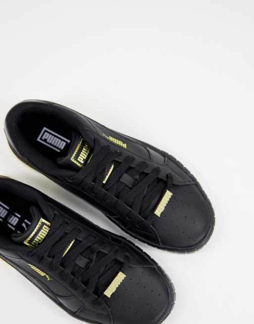 Puma zwart met online goud