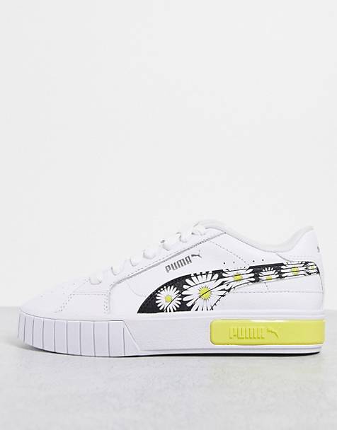 PUMA Cali Star sneakers with daisy print in white and yellow