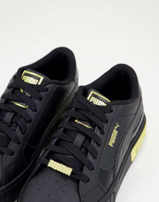 Black and gold puma trainers new arrivals