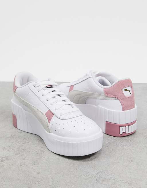 Puma Cali Wedge trainers in white and pink