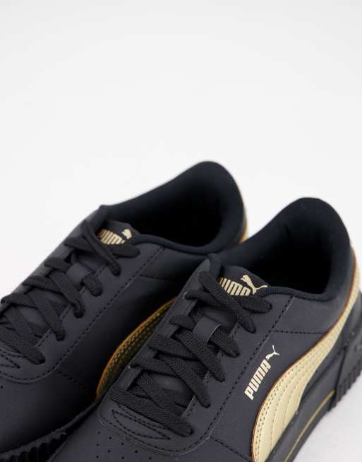 PUMA Carina Meta20 trainers in black and gold