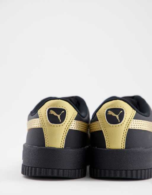 Puma Carina Meta20 trainers in black and gold