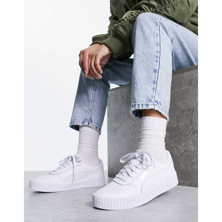 white puma carina sneakers