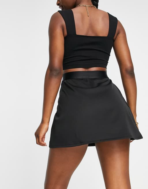 Puma classic asymmetric skirt in black | ASOS