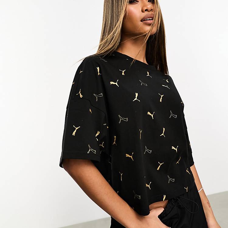 Puma Classics all over logo print t-shirt in black and gold | ASOS