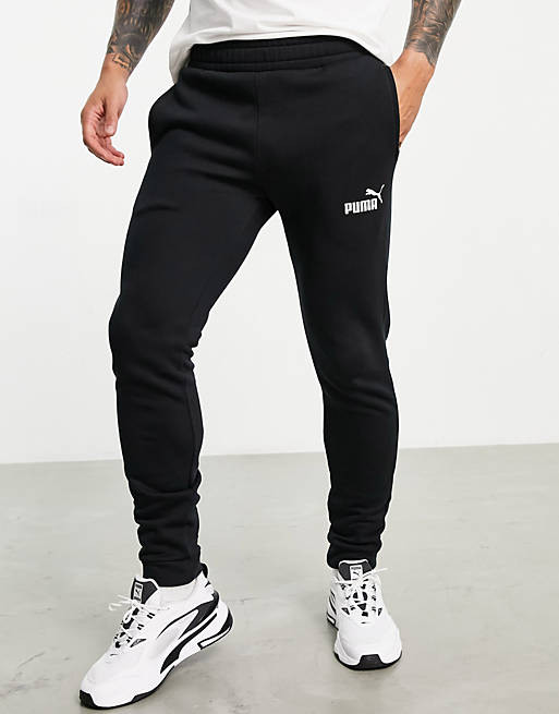 Puma Clean tracksuit bottoms in black | ASOS