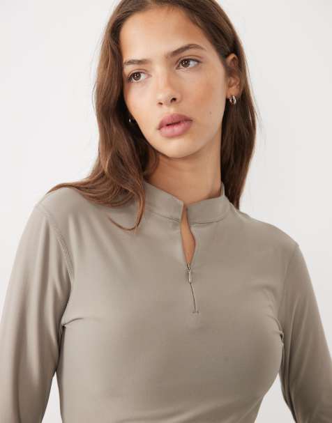 Puma Cloudspun quarter-zip long sleeve top in beige - view 1