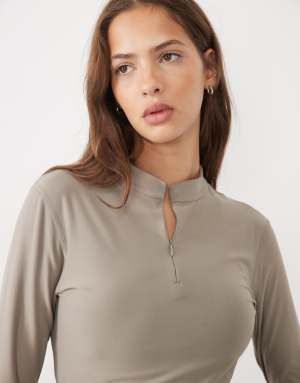 Puma Cloudspun quarter-zip long sleeve top in beige