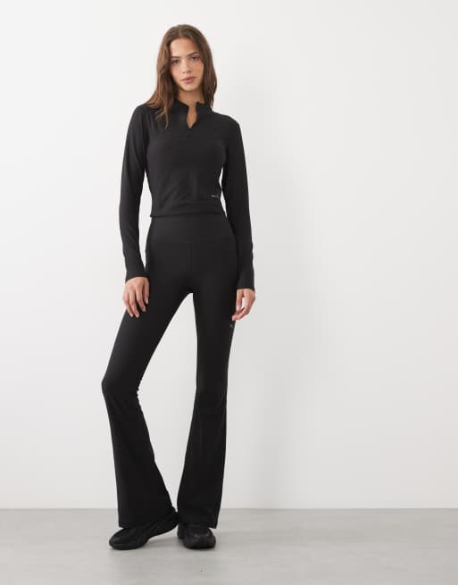 Puma Cloudspun quarter-zip long sleeve top in black, 3 of 4