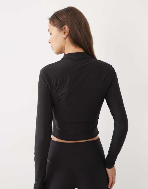 Puma Cloudspun quarter-zip long sleeve top in black, 4 of 4