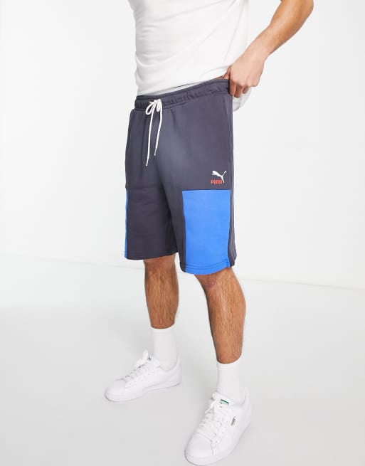 Puma CLSX shorts in navy and blue