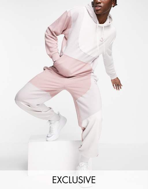 Puma convey joggers in pink colorblock exclusive to ASOS