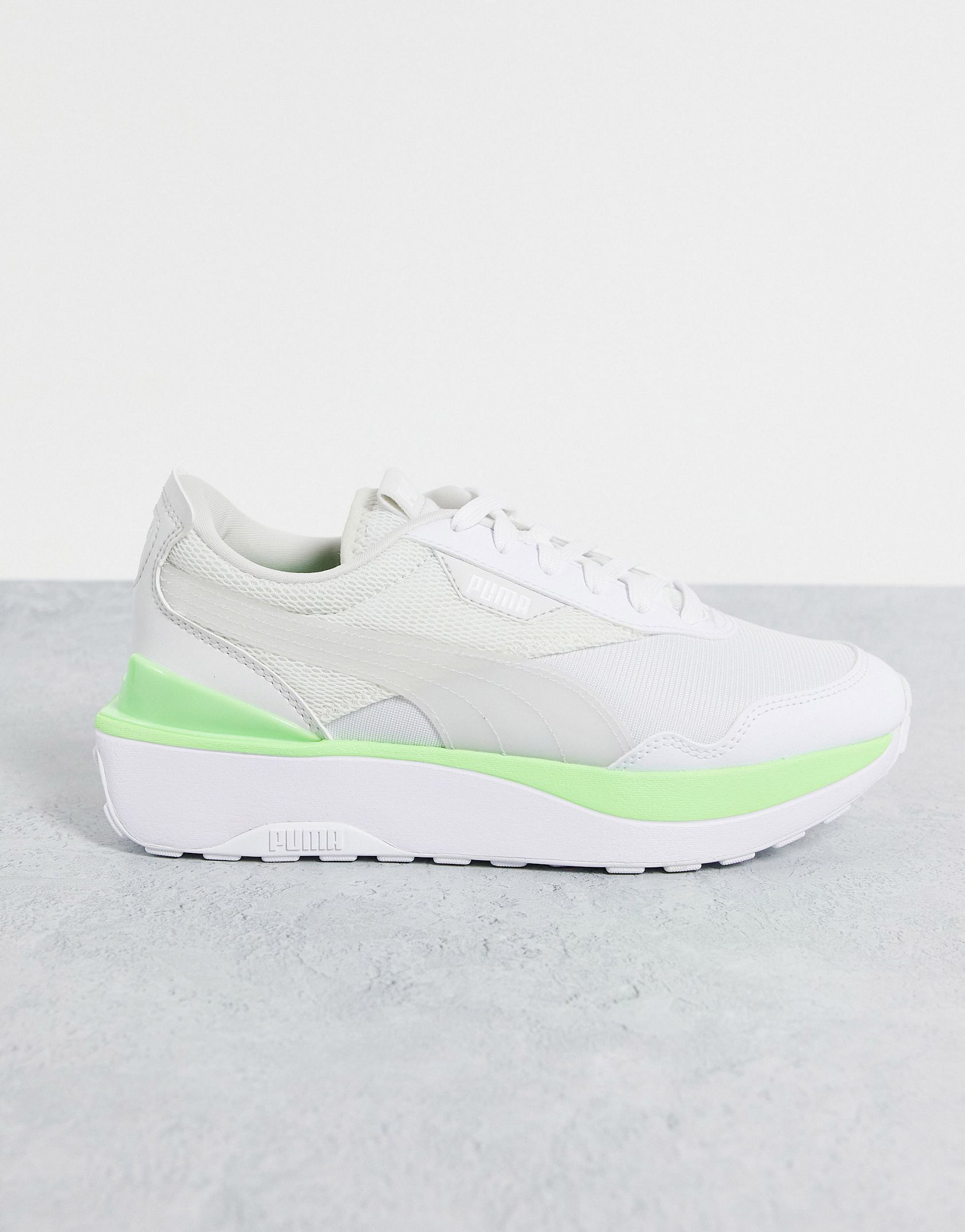 Puma Cruise Rider trainers in white and electric green