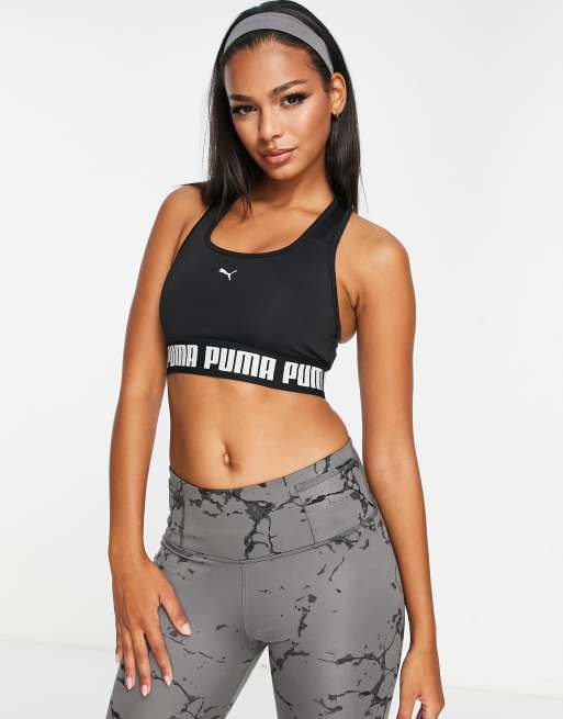 Puma – Czarny biustonosz sportowy zapewniający średnie wsparcie