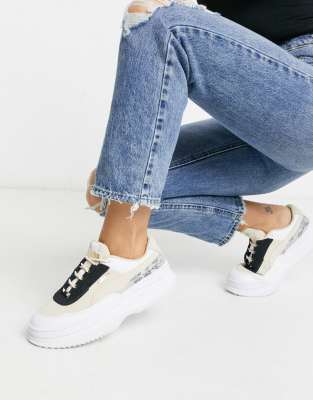 Puma Deva Reptile flatform trainers in 