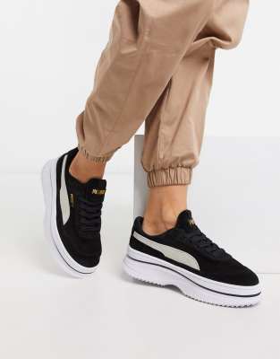 black flatform trainers