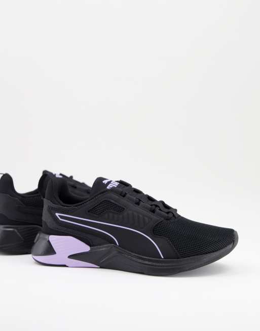 Purple and black store pumas