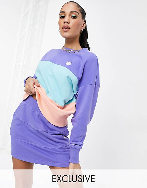Puma Downtown colourblock sweatshirt in purple and orange - exclusive to ASOS