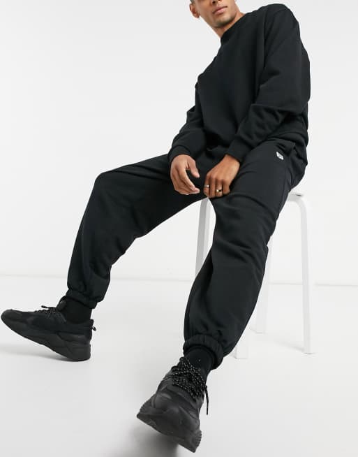 Puma best sale black joggers