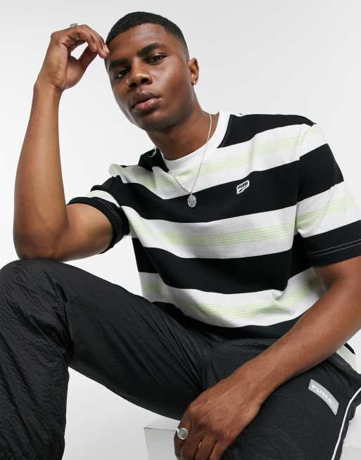 Puma Downtown stripe t shirt in black and white ASOS