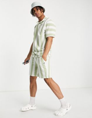 Puma Downtown towelling shorts in green stripe - exclusive to ASOS