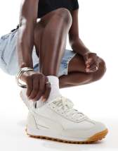 New Balance 1906 sneakers in white with blue and pink details