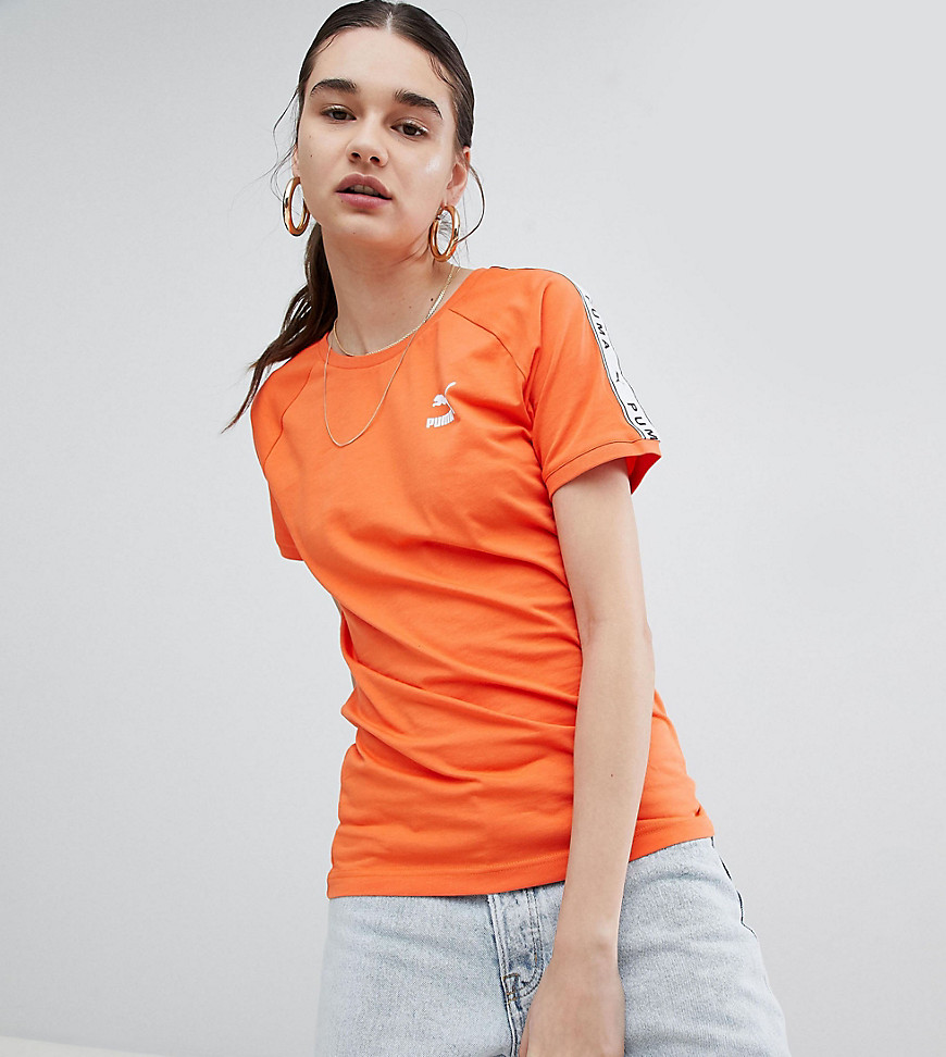 Puma – Endast hos ASOS – Orange T-shirt med sidorand