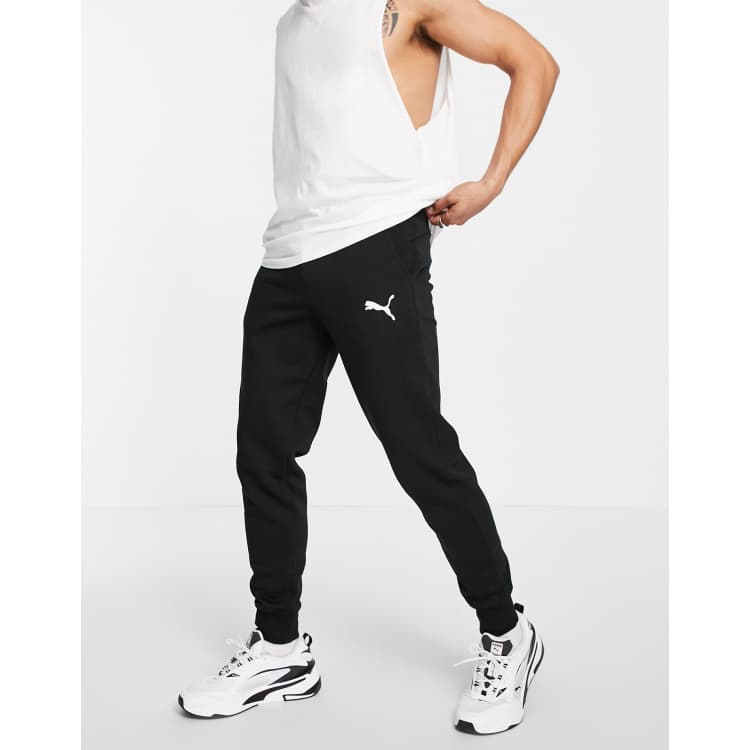 Puma Essentials cat logo joggers in black ASOS