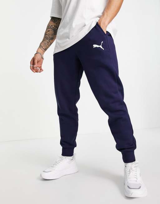 Puma Essentials cat logo joggers in navy