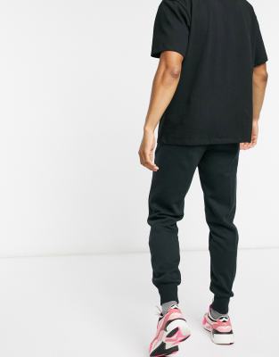 puma essential skinny joggers in black