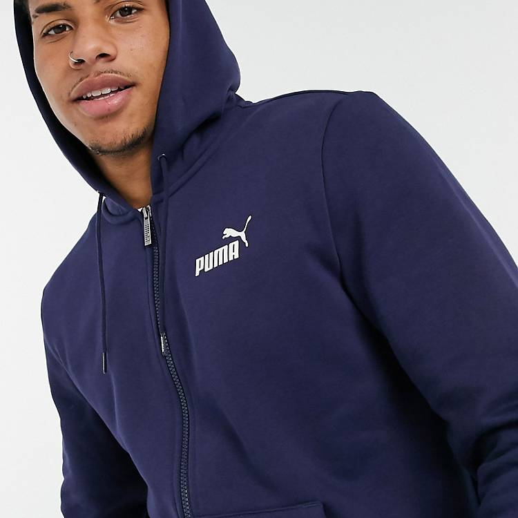 Puma Essentials large front logo zip-up hoodie in navy | ASOS