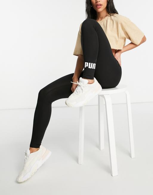 Puma Essentials logo leggings in black | ASOS