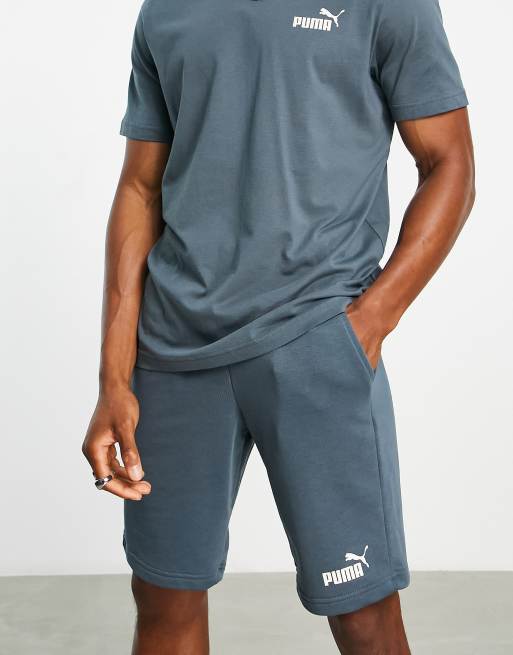 PUMA Essentials Shorts in Dunkelblau mit kleinem Logo ASOS