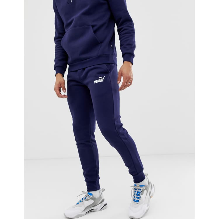 Puma Essentials skinny fit joggers in navy ASOS