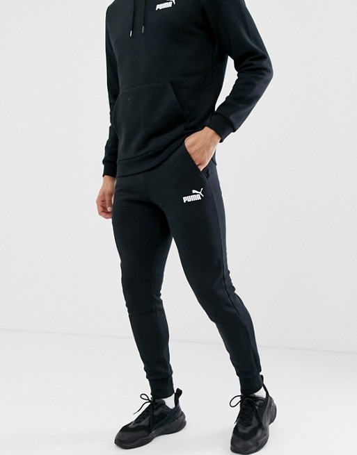 Puma Essentials slim fit joggers in black | Faoswalim