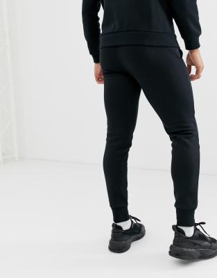 puma essentials skinny fit joggers in black