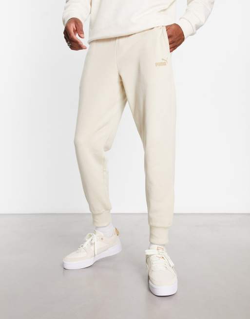 Puma essentials small logo joggers in off white ASOS