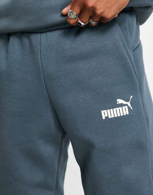 Puma essentials small logo trackies in dark blue ASOS