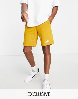 Puma Essentials sweat shorts in mustard exclusive to ASOS