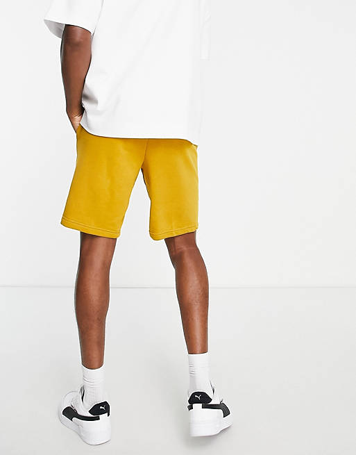 Shorts Puma Essentials sweat shorts in mustard exclusive to  