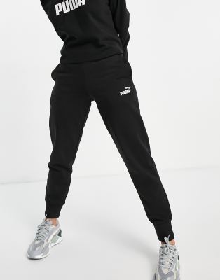 Puma Essentials trackies in black | ASOS