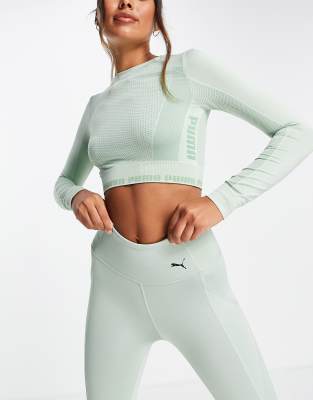 PUMA Training Evoknit Seamless Long Sleeve Crop Top in Green