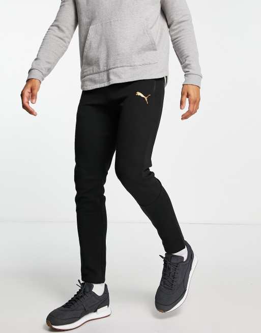 Puma - Evostripe - Joggers neri con logo oro, 4 di 4