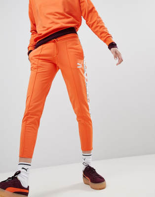 puma taped side stripe track pants