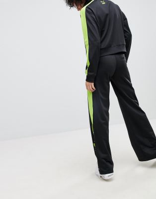 black and lime green track pants