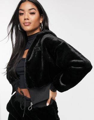 Puma faux fur hoodie in black | ASOS