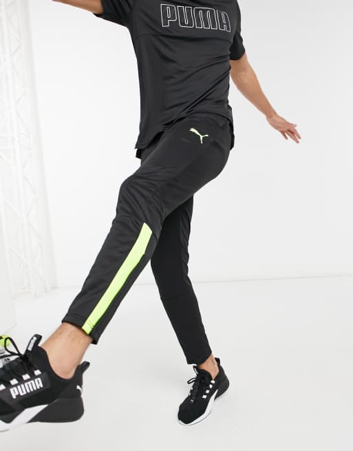 Puma football joggers in black hot sale