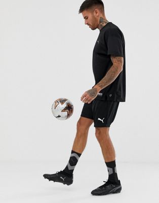 Puma Football logo shorts in black | ASOS