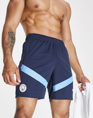 Puma Football Manchester City 2022/23 training shorts in blue - ASOS Price Checker