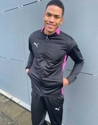 black and pink tracksuit